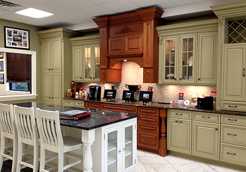 Showroom with marble countertop, cabinets and lighting